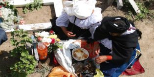 Family feast at the Cemetery - Day of the Death. Ecuador